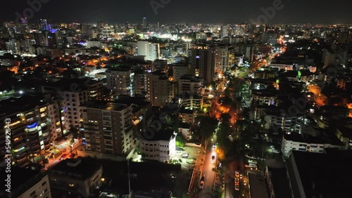 Wallpaper Mural Bella Vista neighborhood at night, Santo Domingo town center in Dominican Republic. Aerial forward Torontodigital.ca
