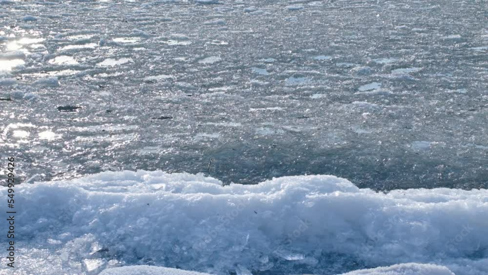 Winter icy waves on the Barrier Lake in Rocky Mountains in Canada Winter icy waves on the Barrier Lake in Rocky Mountains in Canada