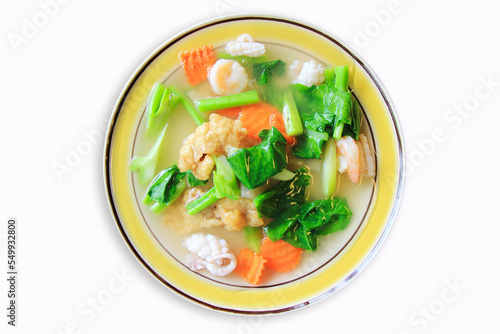 Wide Rice Noodles with Seafood in Gravy Sauce (Rad-Na Talley) on white background, top view photo