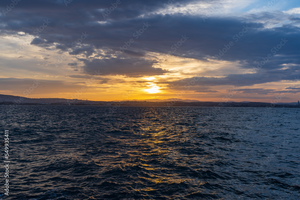 Amazing sunrise view with natural clouds. Morning sun with beautiful colors Amazing sunrise view with natural clouds. Morning sun with beautiful colors