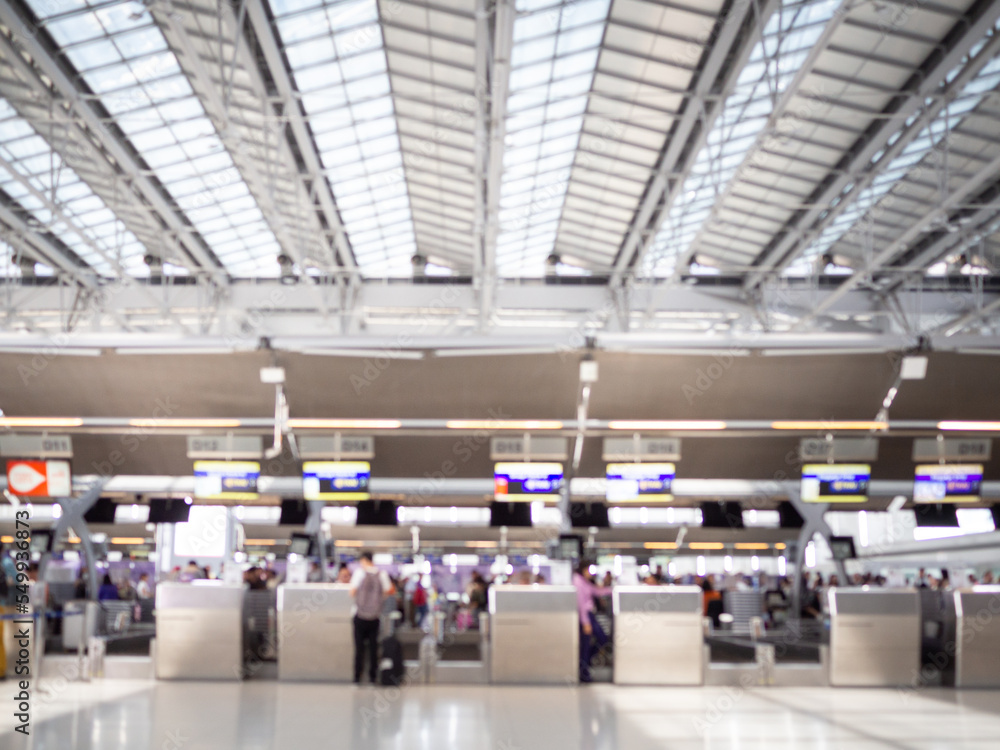 Fototapeta premium BANGKOK, THAILAND - May 3, 2019: inside of Suvarnabhumi Airport. Airport Check-In Counters With Passengers in Bangkok ,Thailand.This airport is handling about 55 million passengers annually.