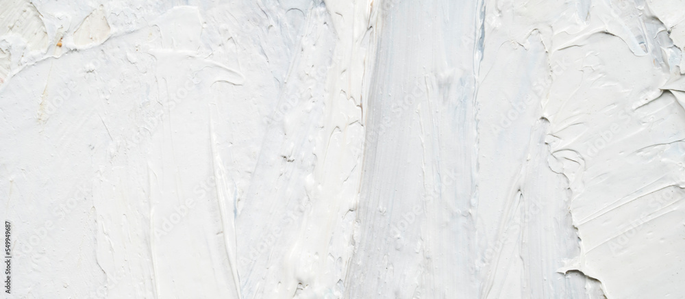 Macro. Abstract art. Expressive embossed pasty oil paints and reliefs. Colors: white. Macro. Abstract art. Expressive embossed pasty oil paints and reliefs. Colors: white.