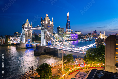 Elevated view of Tower Bridge and skyline London at night, UK