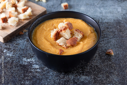 Pumpkin soup with croutons. Light and nutritious autumn dish, ideal for dinner.