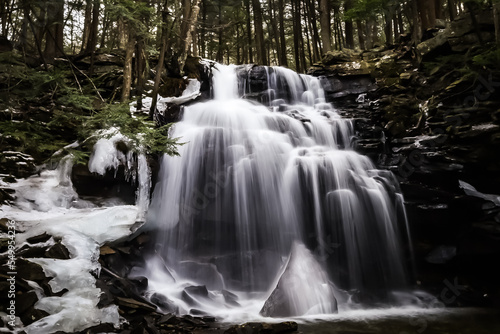 water cascades over the falls at this waterfall from Ricketts Glen  Pennsylvania
