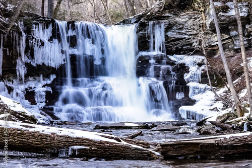 water flows over this waterfall in Ricketts Glen, PA