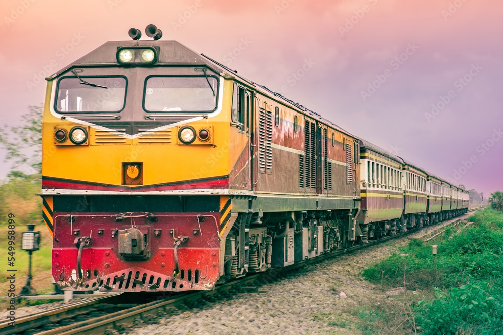 Passenger train by diesel locomotive on the railway. Passenger train by diesel locomotive on the railway.
