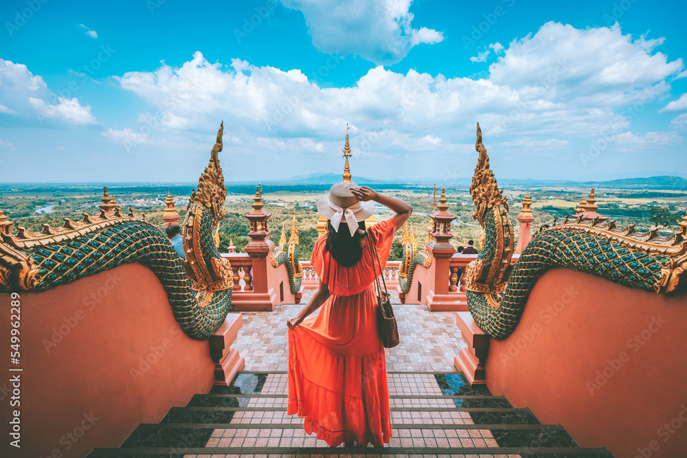 Traveler asian woman with dress travel in temple at Lampang Thailand - obrazy, fototapety, plakaty 
