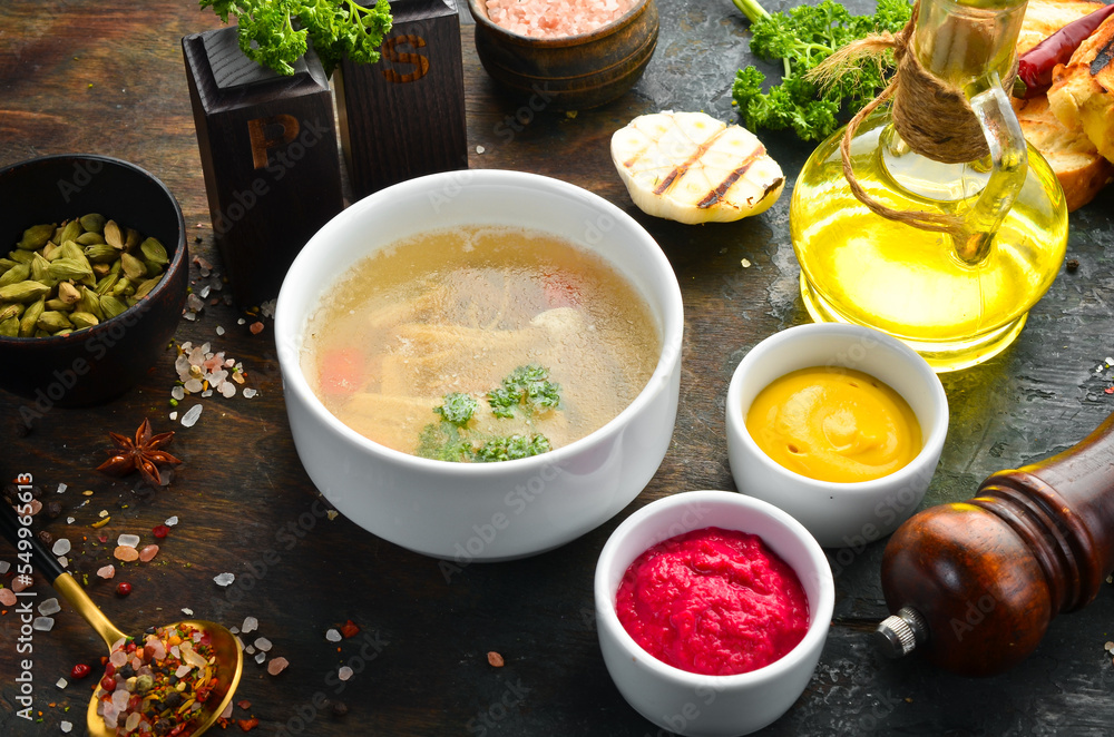 Meat jellies with mustard and beet sauce. Cold snacks. Top view Meat jellies with mustard and beet sauce. Cold snacks. Top view
