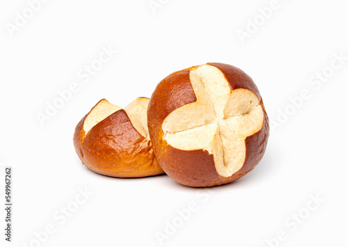 Traditional Bavarian pretzel roll bun isolated on white background