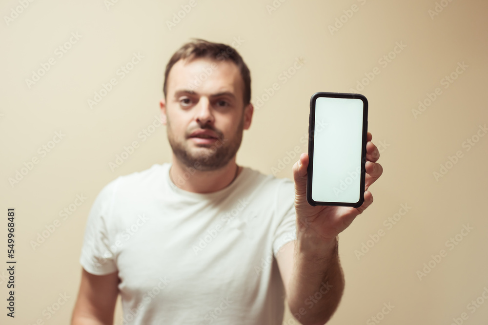 bearded man with smartphone,background for advertising