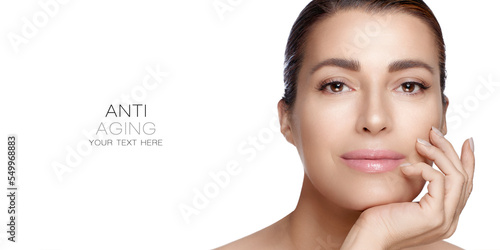 Beauty and Skincare Concept. Beautiful natural middle age woman with nude makeup on a flawless skin. Beauty Face Spa Woman