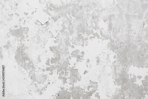 Abstract Grunge White Paint peeling plaster walls. damaged concrete white background.