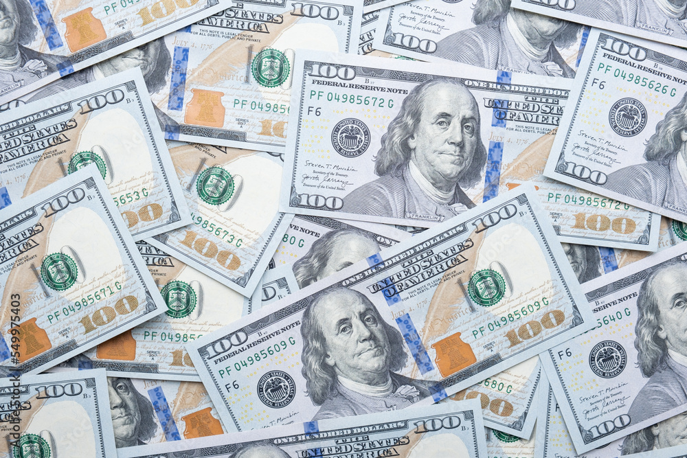 Texture of dollar bills. One hundred dollars. Close-up. Texture of dollar bills. One hundred dollars. Close-up.