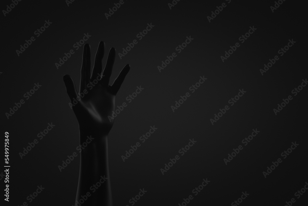 Dark hand raised. Dark background