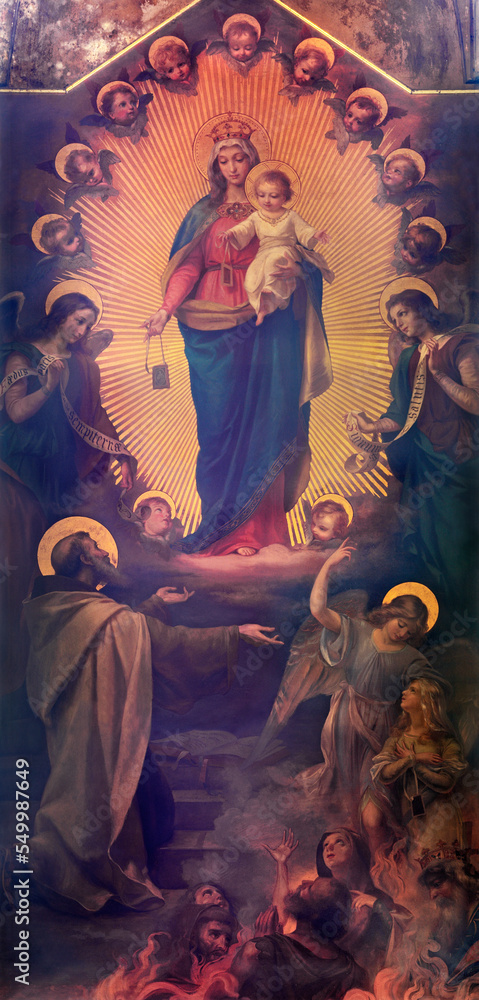 BIELLA, ITALY - JULY 15, 2022: The painting of Madonna of Scapular as the helper of souls in purgatory with the St. Simon Stock  in Cathedral (Duomo) from 19. cent.