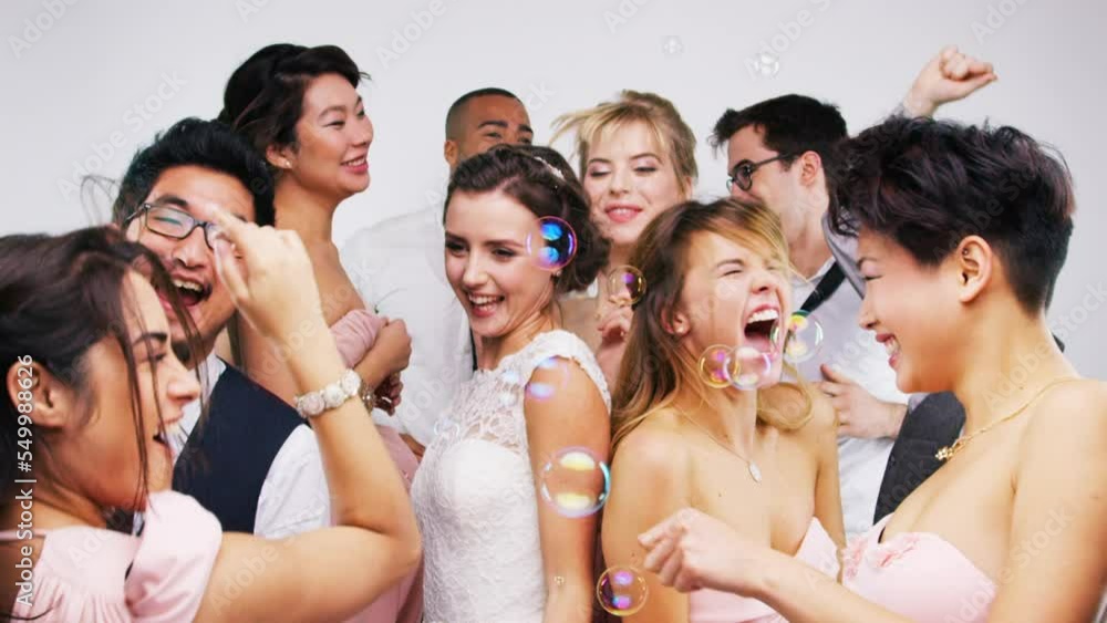 Dance, celebration with wedding, friends at party with fun energy, dancing and happy men with women and bubbles. Celebrate, wedding party and social group with happiness and young friends celebrating Dance, celebration with wedding, friends at party with fun energy, dancing and happy men with women and bubbles. Celebrate, wedding party and social group with happiness and young friends celebrating