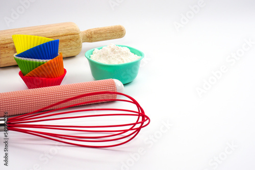 Bakery equipment or kitchenware on a white background (selective focus). Materials or kitchen equipment for bakery.