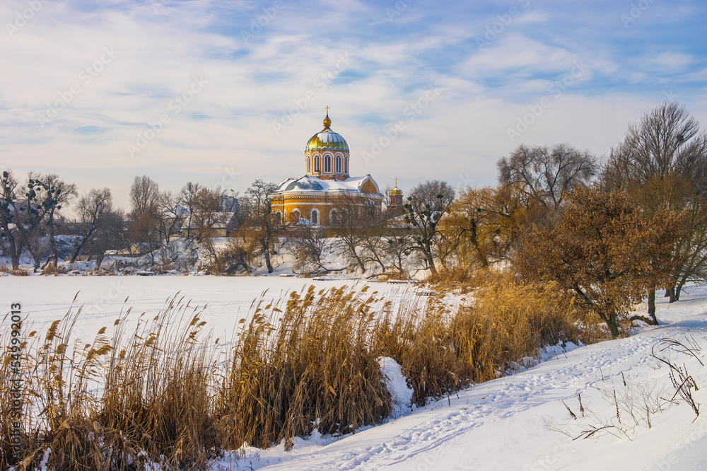 Historical church of Smila on the shore of the frozen lake. Cherkasy region, Ukraine Historical church of Smila on the shore of the frozen lake. Cherkasy region, Ukraine