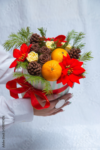beautiful bouquet of chocolate orange flowers and red ribbon