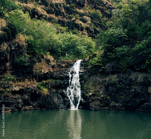 Mesmerizing view of Waimea Falls waterfall in national park Oahu, Hawaii photo