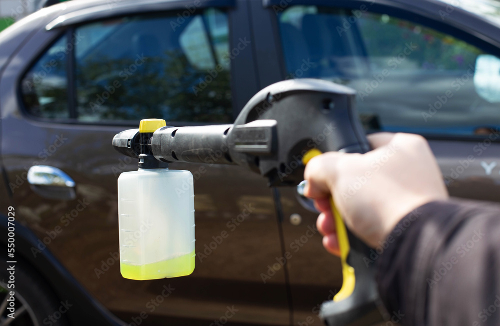 Nozzle foam generator for a sink of a high pressure. car chemicals, shampoo concentrate. Car care. copy space for text Nozzle foam generator for a sink of a high pressure. car chemicals, shampoo concentrate. Car care. copy space for text