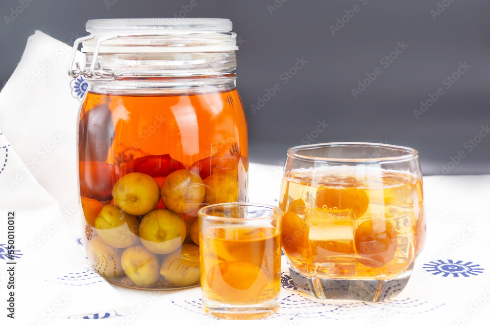 Glass of Japanese plum wine 'Umeshu',Japanese plum wine.Pickled plum wine. Glass of Japanese plum wine 'Umeshu',Japanese plum wine.Pickled plum wine.