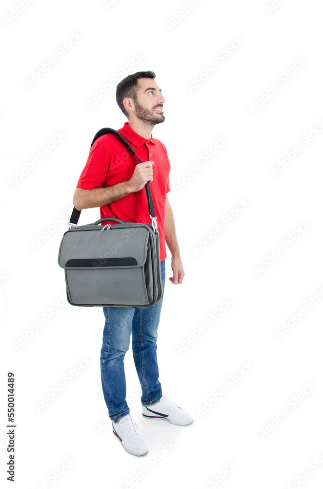 Cool man standing with computer briefcase looking up on copy space. Isolated on white background. Studio shot. Full length Cool man standing with computer briefcase looking up on copy space. Isolated on white background. Studio shot. Full length
