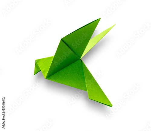 Green paper dove origami isolated on a white background