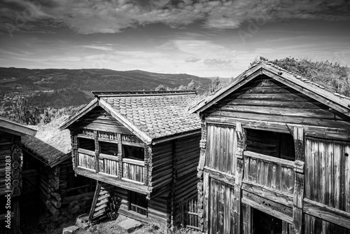 view on wooden huts against mountain ran in Lillehammer Norway photo