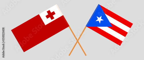 Crossed flags of Tonga and Puerto Rico. Official colors. Correct proportion photo