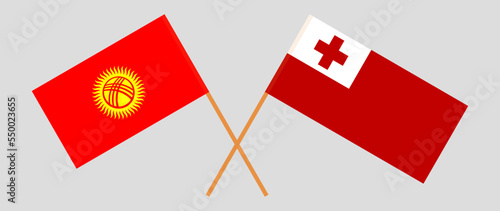 Crossed flags of Kyrgyzstan and Tonga. Official colors. Correct proportion