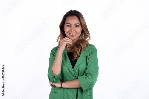 Young asian woman, professional entrepreneur standing in office clothing, smiling and looking confident, white background. © Parichat