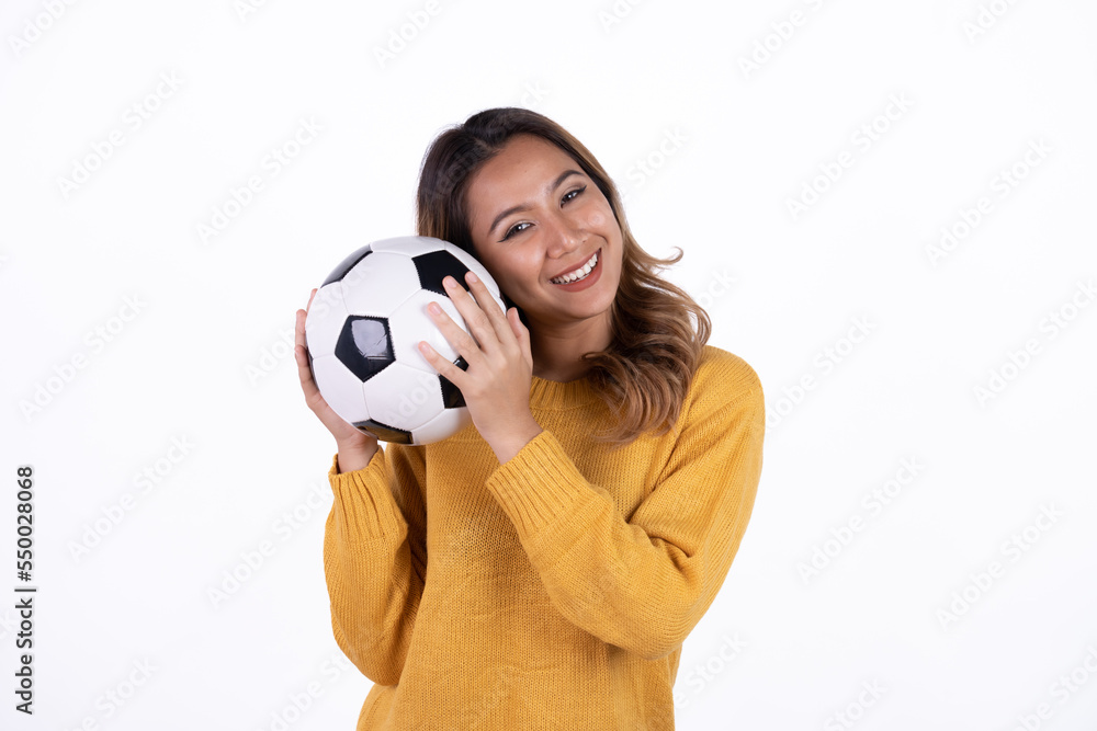 Happy Asian woman football fan cheer up support favorite team with soccer ball isolated on white background. Happy Asian woman football fan cheer up support favorite team with soccer ball isolated on white background.
