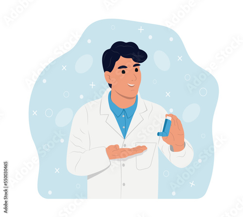 A young smiling doctor man holds an inhaler for inhalation in his hands. Childrens doctor. World Asthma Day.Bronchial Asthma. Allergy, asthmatic. Inhalation drug. Bronchial asthma.