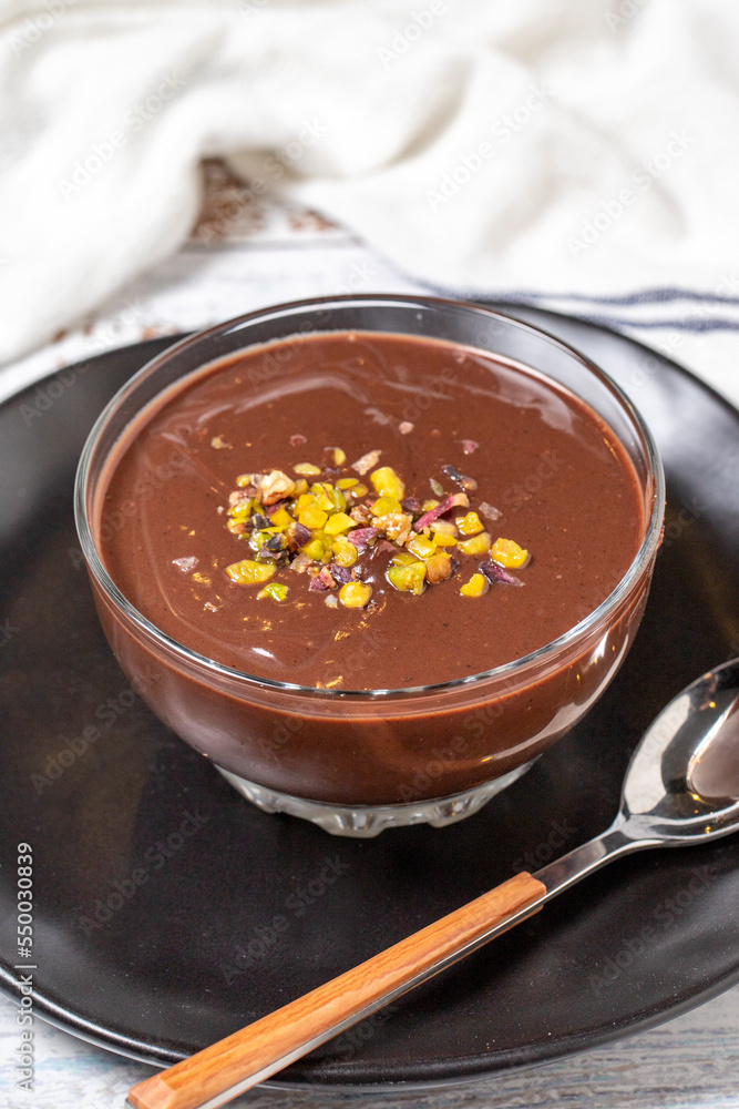 Chocolate supangle. Chocolate cocoa pudding on a white wood background. close up Chocolate supangle. Chocolate cocoa pudding on a white wood background. close up