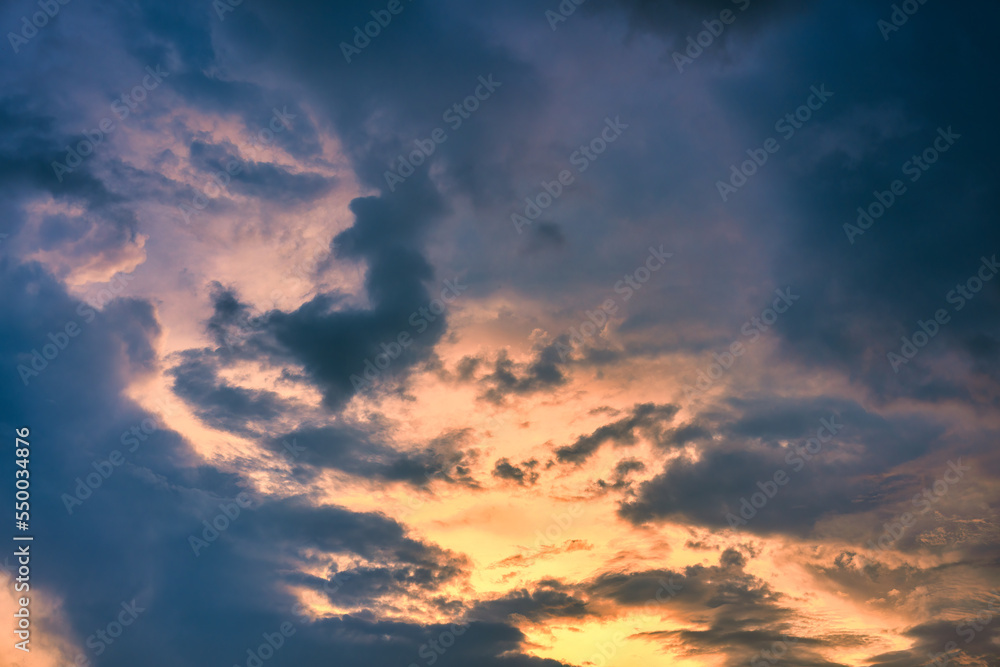 Beautiful dramatic sunset sky with clouds
