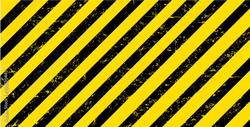 Grunge yellow and black stripes warning industrial background. Vector warn caution, construction, safety backdrop with diagonal lines and grungy texture for road or factory attenstion