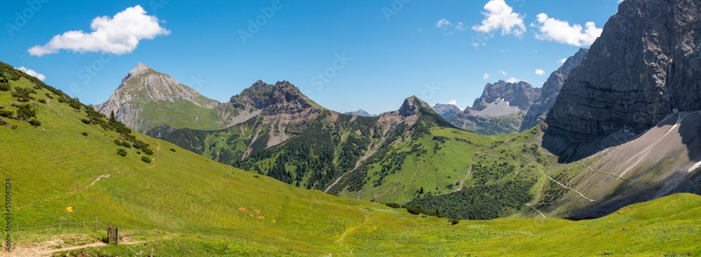 The panorama of Karwendel mountains - look to Teufelskopf and Gumpfenspitze peaks (link) from way to Falkenhutte chalet.