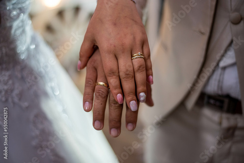 bride and groom hands