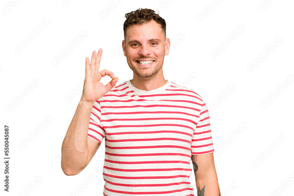 Young caucasian handsome man isolated cheerful and confident showing ok gesture. Young caucasian handsome man isolated cheerful and confident showing ok gesture.
