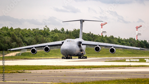 American military airf orce transport aircraft departing an air base.