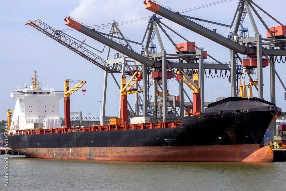 Industrial ship moored in a port Industrial ship moored in a port