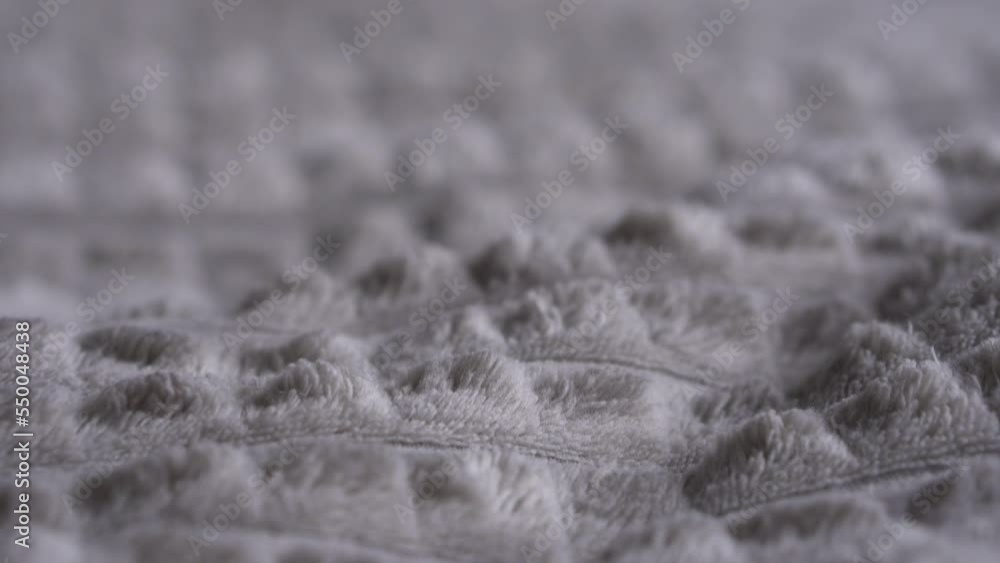 Close up detailed cloth texture. Wavy clean grey elastic wave material. Textile abstract background. Clothing industry concept. Close up detailed cloth texture. Wavy clean grey elastic wave material. Textile abstract background. Clothing industry concept.