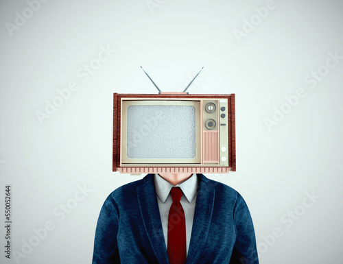Businessman with a tv instead of head . Fake news and propaganda concept.