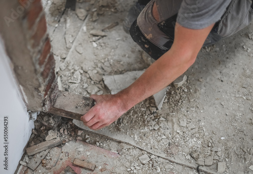 A person working in a doorway.