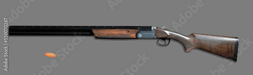 sports double barrel shotgun for shooting clay pigeons on a round stand photo