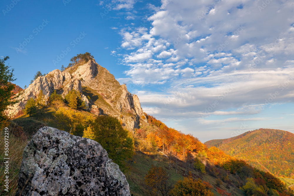 View of autumn landscape with rocky cliffs. The Vrsatec National Nature Reserve in the White Carpathian Mountains, Slovakia, Europe.