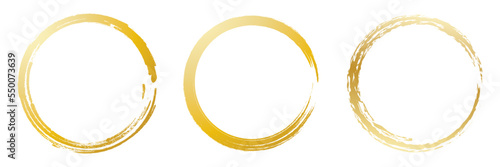 Golden circle with golden brush texture on white background. Set of round brush strokes.