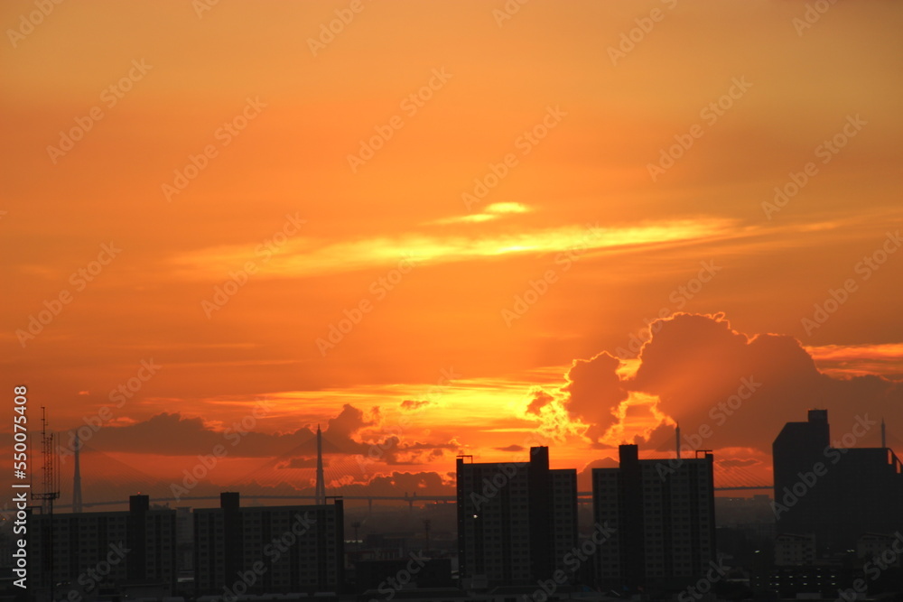 sunrise sunset sky with clouds over the mountain view background 